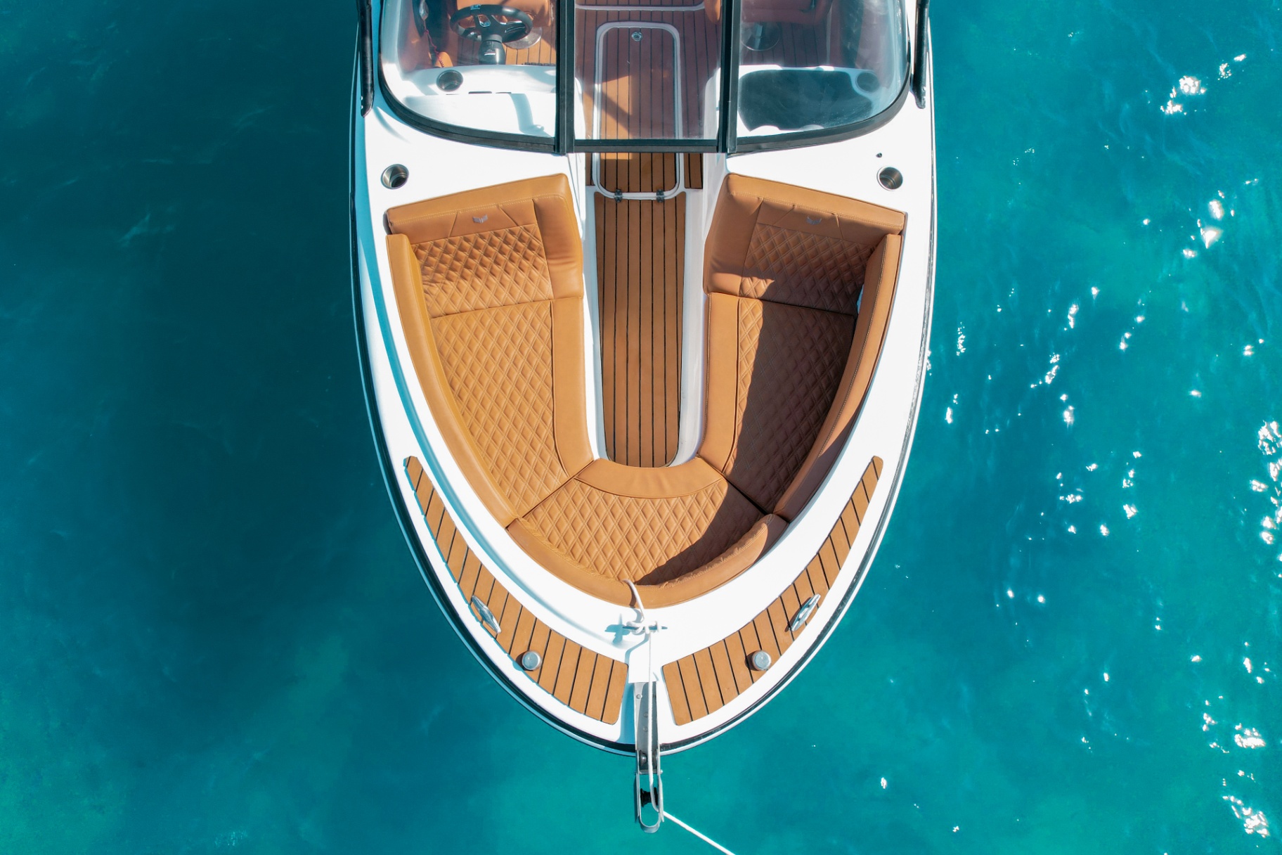 Aerial bow detail of Bowfin with diamond-stitched tan seating